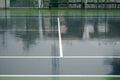 Wet tennis court Royalty Free Stock Photo