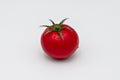 Wet Tomato. garden fresh tomato, tomato  on white back ground Royalty Free Stock Photo