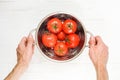 Wet Tomatoes in a Colander After Washing Royalty Free Stock Photo