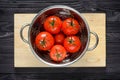 Wet Tomatoes in a Colander After Washing Royalty Free Stock Photo