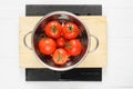 Wet Tomatoes in a Colander After Washing Royalty Free Stock Photo