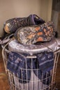 Wet used boots and socks drying over firewood stove Royalty Free Stock Photo
