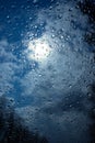 Wet windshield, taken from inside the car.Rain falls on the surface of a car glass window with a gray backgroundWet windshield tak Royalty Free Stock Photo