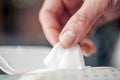 Gently Hand picked a wet wipes in package box, Wet wipes in a woman`s hand Royalty Free Stock Photo