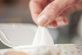 Gently Hand picked a wet wipes in package box, Wet wipes in a woman`s hand Royalty Free Stock Photo