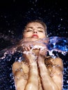 Wet woman face with water drop. Royalty Free Stock Photo