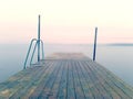 Wet pier in smooth water of sea bay. Mole anchored with steel poles into bottom Royalty Free Stock Photo