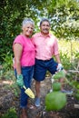 Weve been gardening together since the day we got married. a happy senior couple gardening together in their backyard. Royalty Free Stock Photo