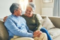 Weve always been happy together. an affectionate senior couple relaxing on a sofa together at home. Royalty Free Stock Photo