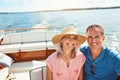 Weve got the sea all to ourselves. Portrait of a mature couple enjoying a relaxing boat ride. Royalty Free Stock Photo