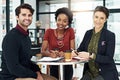 Weve yet to meet a project we cant accomplish. Cropped portrait of a group of businesspeople meeting around a small Royalty Free Stock Photo