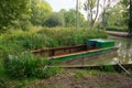 Wey & Arun Canal, Sussex, UK. Barge in need of restoration. Wey & Arun Canal, Sussex, UK