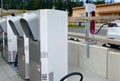 Weyarn, Germany - August 16, 2019: Tesla electric car charging station with enormous infrastructure in the foreground Royalty Free Stock Photo