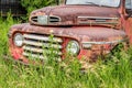 Weyburn, SK- July 19, 2020:  Classic red Mercury pickup truck abandoned on the Canadian prairies Royalty Free Stock Photo