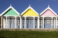 A row of beach huts in sunlight along the Esplanade promenade, Weymouth, Dorset, Royalty Free Stock Photo