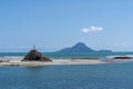 Whale Island off coast of Whakatane with Lady on Rock Royalty Free Stock Photo