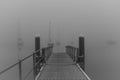 Wharf and Boats in the Fog in Black and White Royalty Free Stock Photo