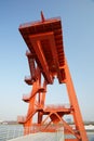Wharf crane in vertical composition Royalty Free Stock Photo