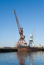 Wharf with hoisting cranes Royalty Free Stock Photo