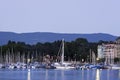 Wharf of Lake Geneva at dusk seen from lake side, Switzerland Royalty Free Stock Photo