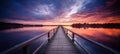 Wharf pier. sunset lake sky. red and blue sunset reflection on a lake