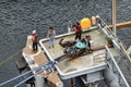 Wharf Workers Securing Large Ship to Dock Royalty Free Stock Photo