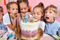 What amazing creative cake. kids being shocked at unusual dessert