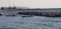 what a beautiful winter landscape with seagulls and boats