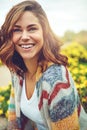 What better place to feel happy and free. an attractive young woman enjoying a spring day outdoors.