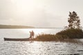 What better way to explore nature than by canoe. a young couple going for a canoe ride on the lake.