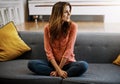 What better way to spend a leave day. an attractive young woman relaxing on the sofa at home.