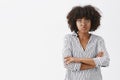 What a bummer. Gloomy and upset good-looking African American woman feeling gloomy and regretting plans for night ruined Royalty Free Stock Photo