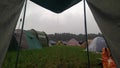 What a bummer: tent lookout during rain on a camp