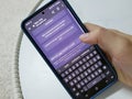 A person typing how can I use ChatGP at work. ChatGPT is an Artificial intelligence chatbot service provided by OpenAI