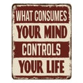 What consumes your mind controls your life vintage rusty metal sign Royalty Free Stock Photo