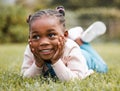 What a cutie pie. a little girl happily spending time alone in her family garden. Royalty Free Stock Photo