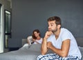 What did I do now. a young couple having marital problems in the bedroom at home. Royalty Free Stock Photo