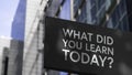 What did you learn today? on a sign in front of the city