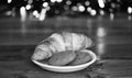 What do kids around world leave for Santa. Croissant and oat cookies on white plate. Winter holiday tradition. Sweets Royalty Free Stock Photo