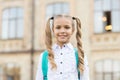 What do you know. First day of school. Happy schoolgirl urban background. Little schoolgirl back to school. Small