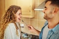 What do you think about my pancakes. a young man feeding his girlfriend pancakes. Royalty Free Stock Photo