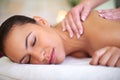 This is what dreams are made of. a young woman enjoying a back massage at a spa. Royalty Free Stock Photo