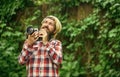 What a great day. reporter make photo. vintage camera. capture these memories. SLR camera. hipster man with beard use Royalty Free Stock Photo