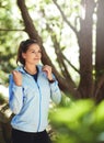 What a great day for a run. a young woman warming up for a trail run. Royalty Free Stock Photo