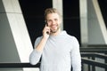 What great news. Man with beard call smartphone urban background. Guy happy smile use smartphone to communicate friends Royalty Free Stock Photo