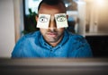 What happens when youve worked too much overtime. a tired young businessman working late in an office with sticky notes Royalty Free Stock Photo