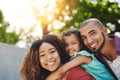 This is what happily ever after looks like. a happy little girl and her parents having fun in their backyard. Royalty Free Stock Photo