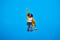 What if the sky is not your limit. Full length shot of a happy young woman jumping into the air against a blue Royalty Free Stock Photo