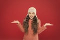 So what. Just want to have fun. Winter outfit. Cute model enjoy winter style. Small child long hair wear hat. Wintertime Royalty Free Stock Photo