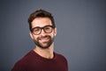 What a man. Studio shot of a handsome and happy young man posing against a gray background. Royalty Free Stock Photo